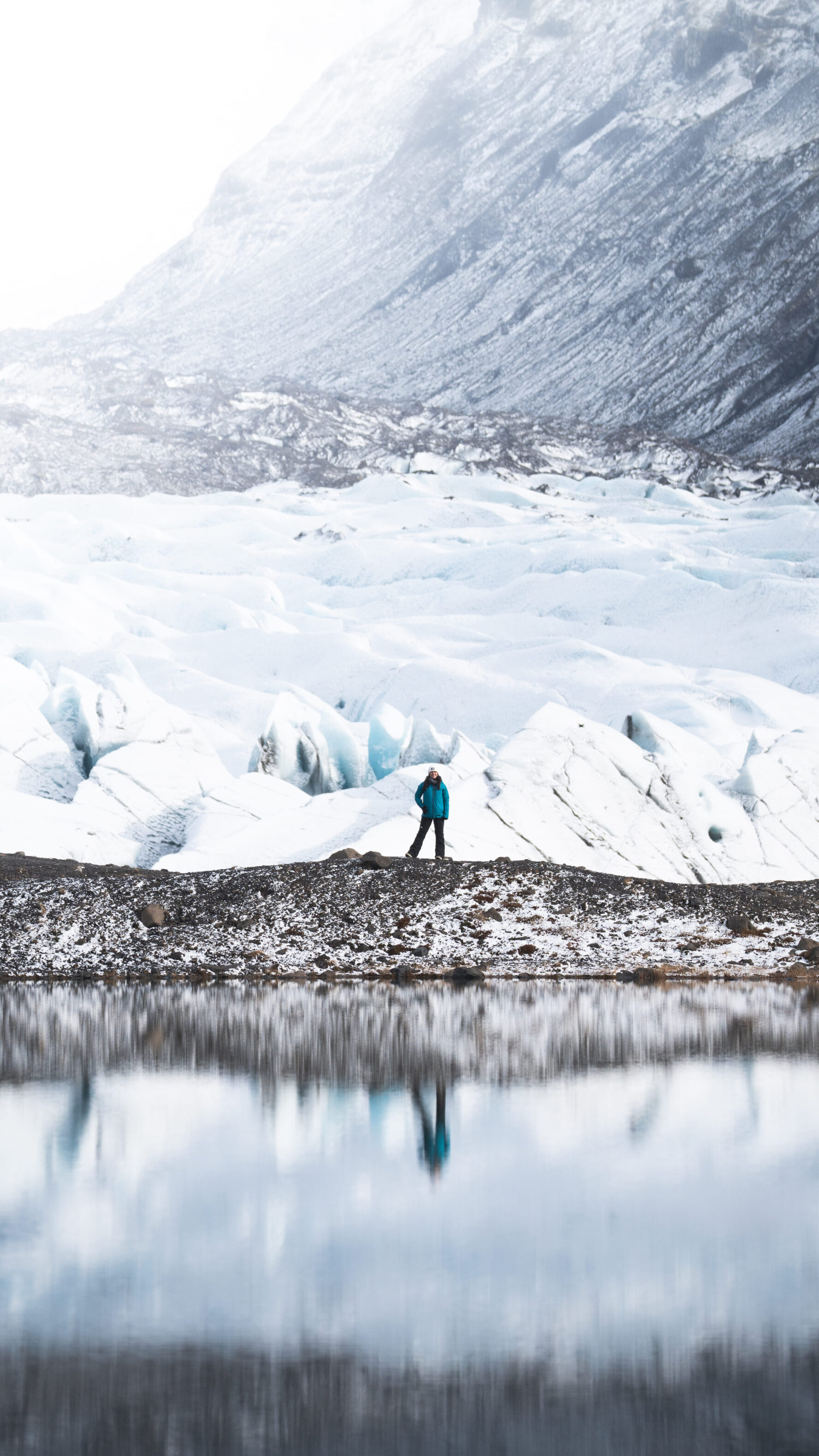 Hiker near water in Iceland
