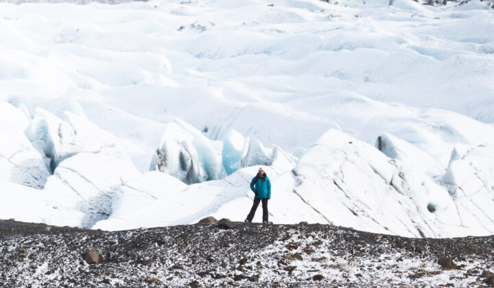 Hiker near water in Iceland