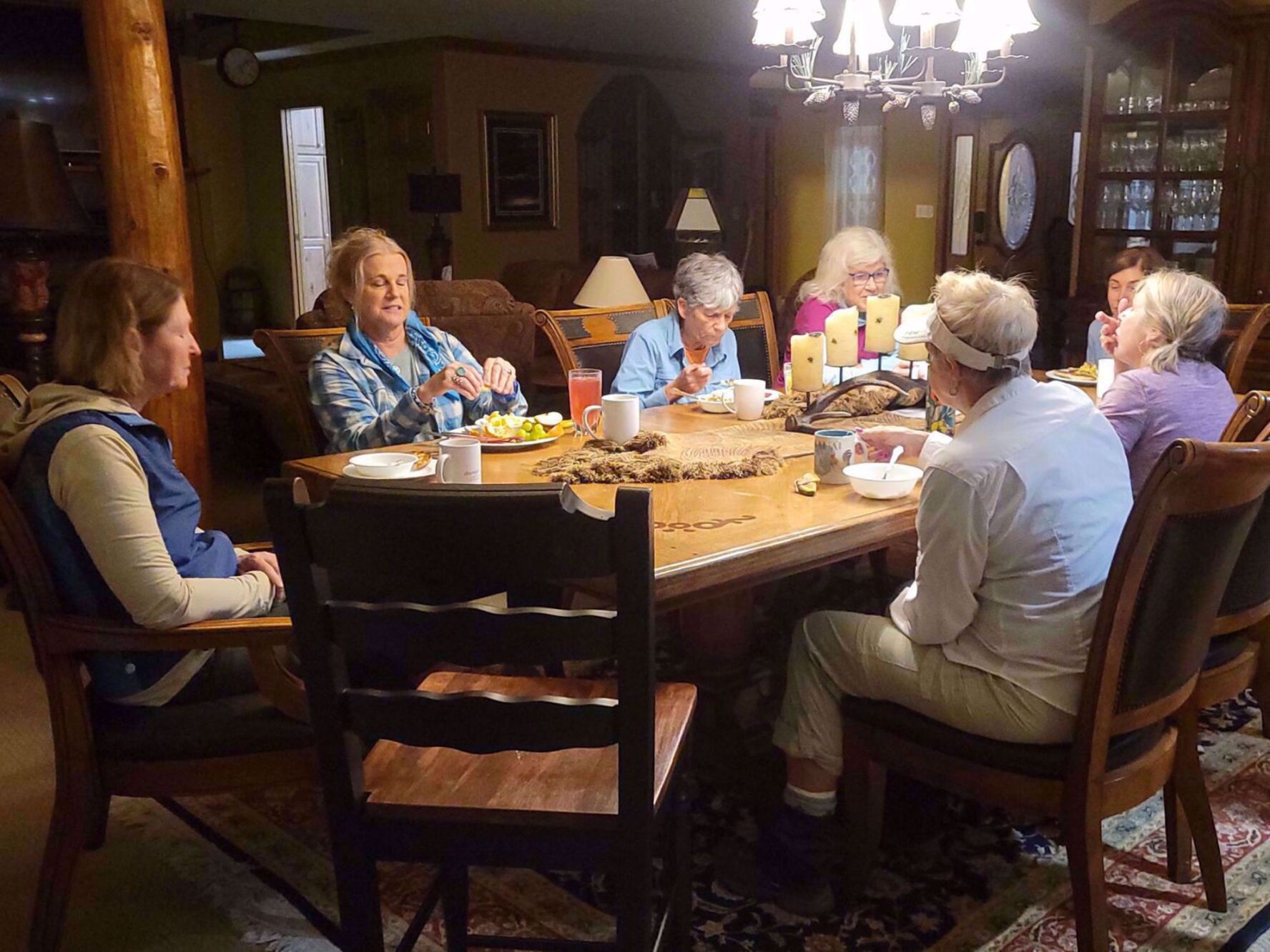 Hikers enjoying dinner on the Rocky Mountain National Park women trip