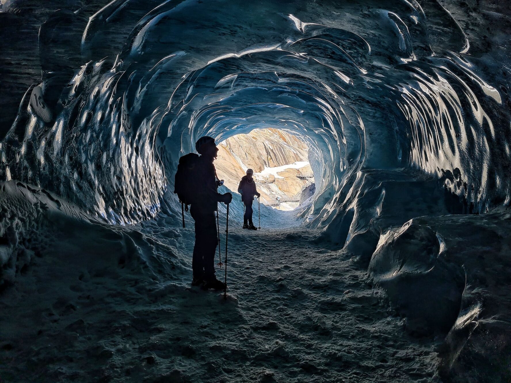 Hikers in the ice cave on the Mer de Glace day tour