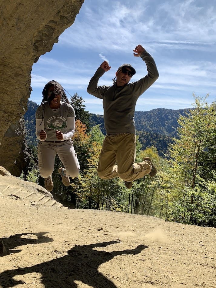 Hikers jumping for joy