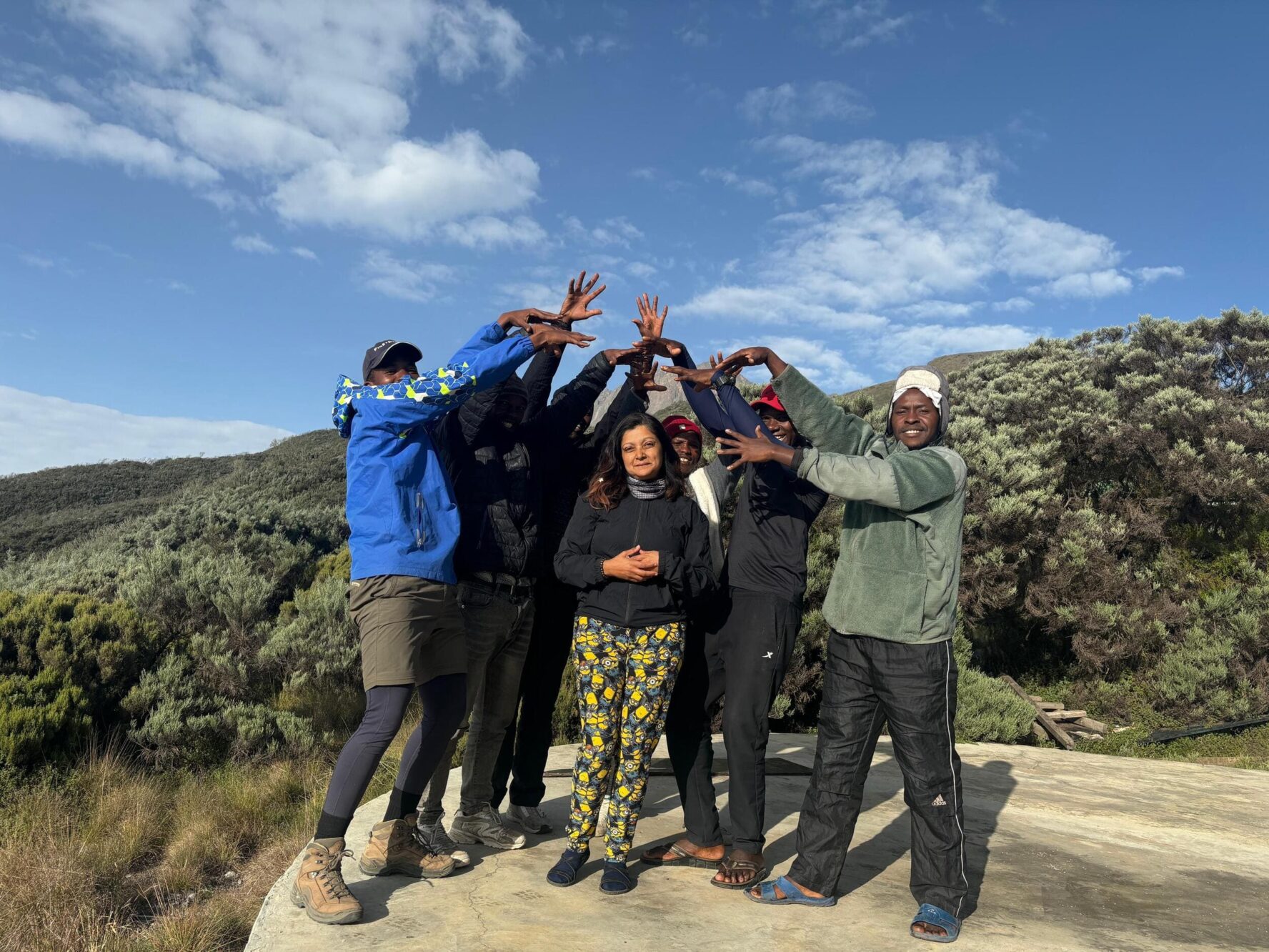 Hikers on Mount Meru