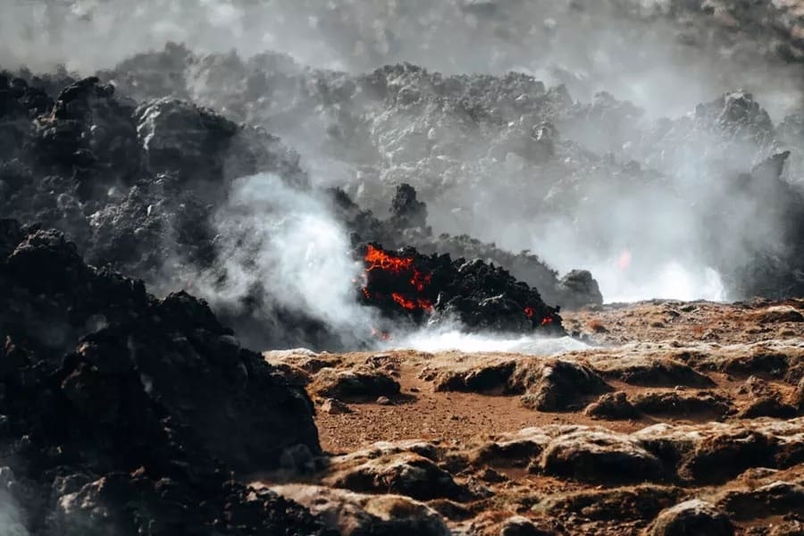 Hot volcanic lava steaming