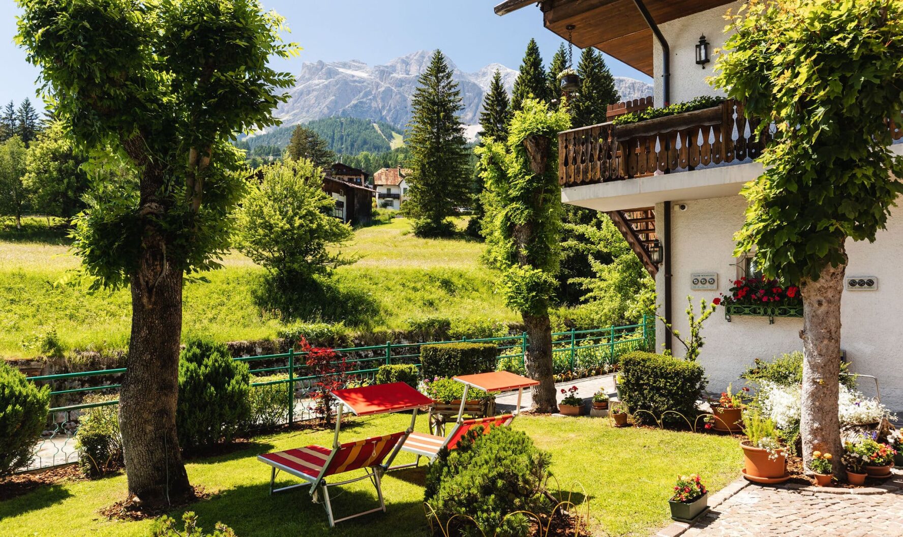 Garden at Hotel Pontechiesa in Cortina