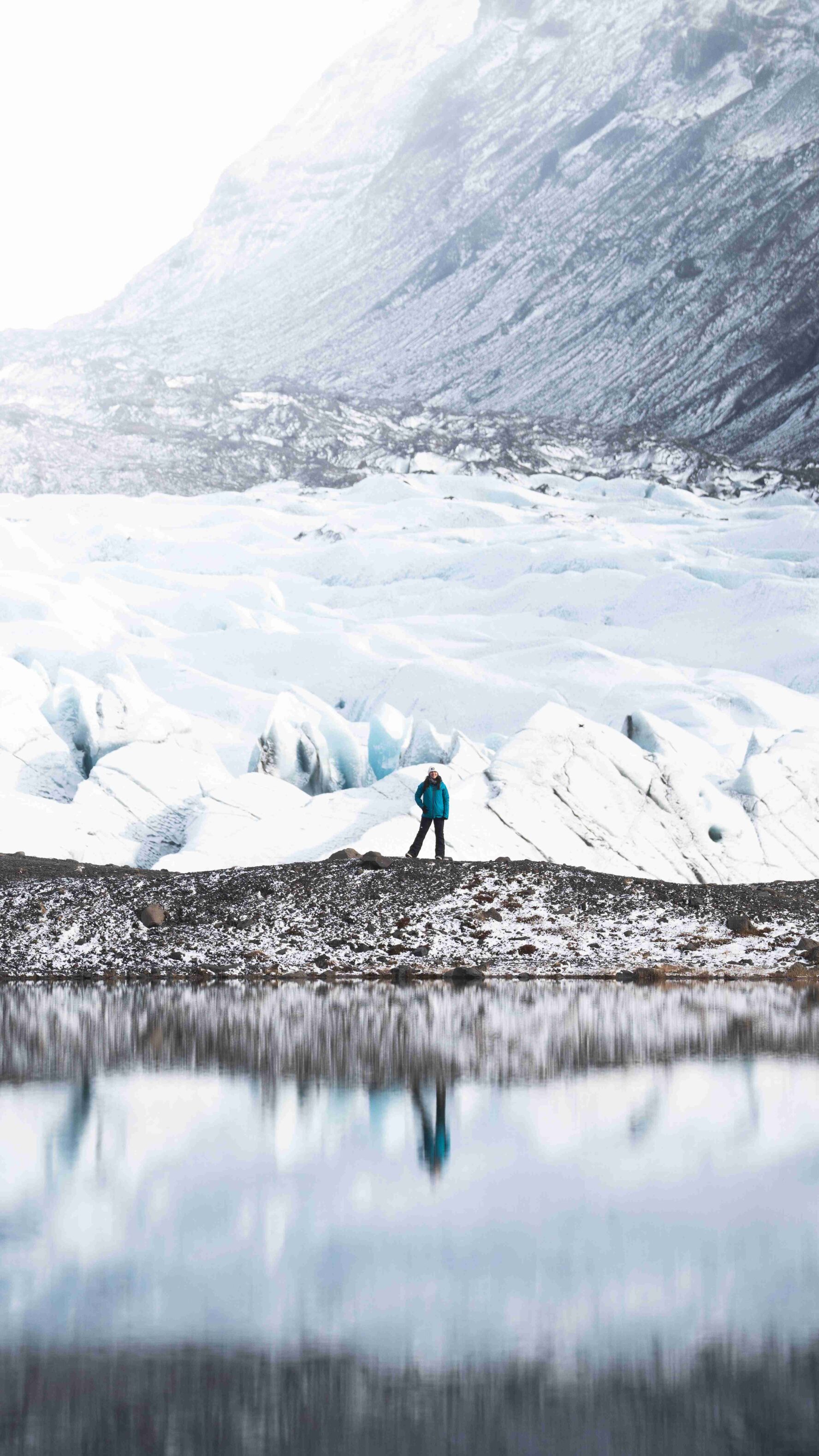 A hiker near a glacier in Iceland