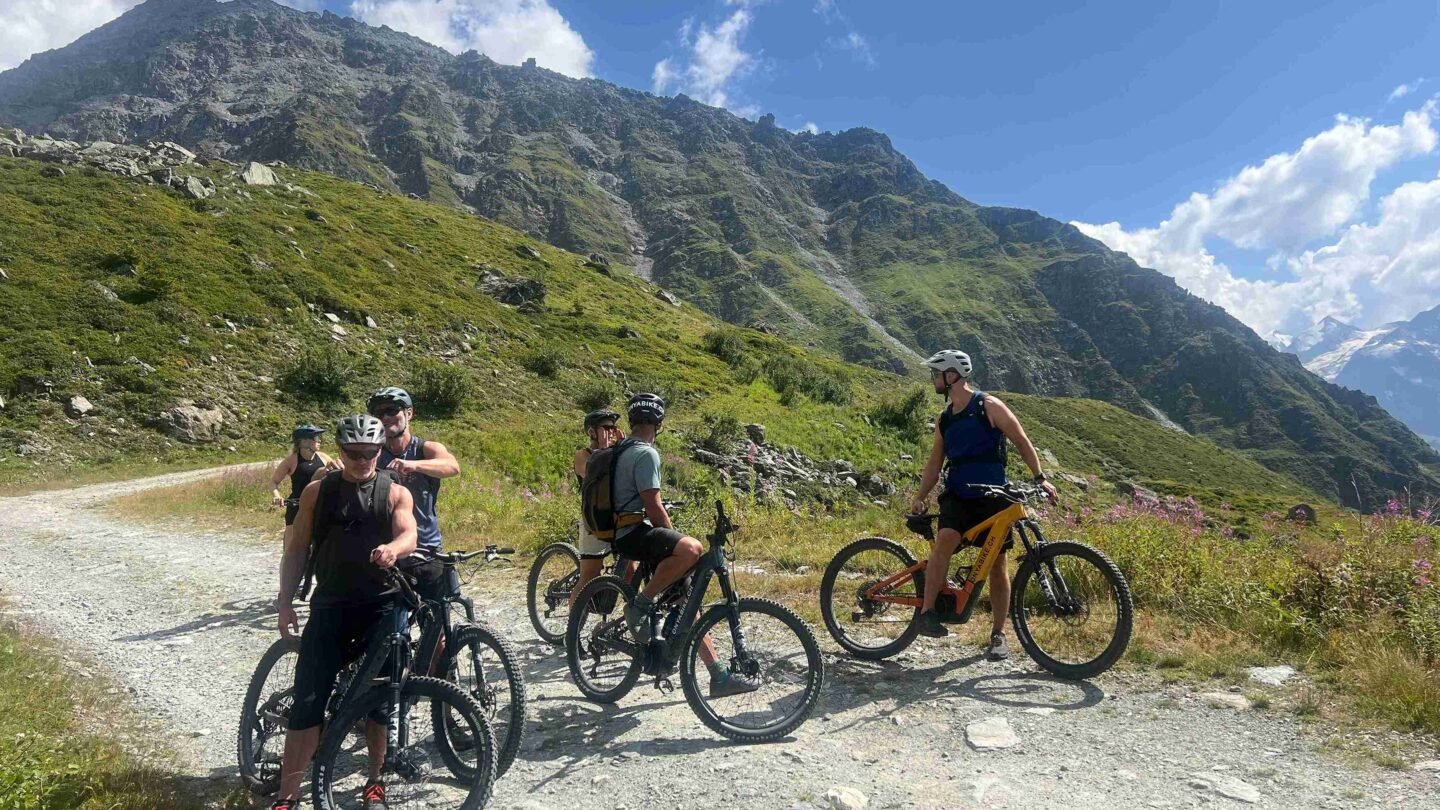 Riders looking back on the Swiss Valais
