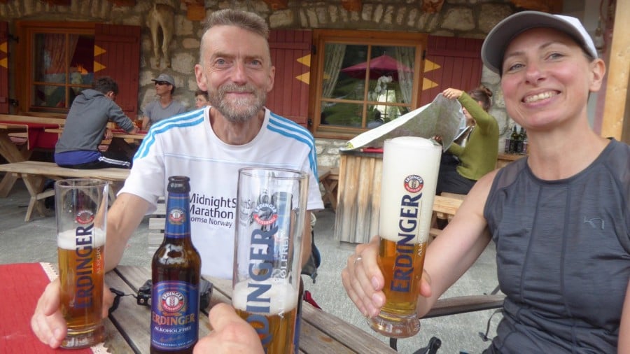Trail runners enjoying a beer in the Dolomites