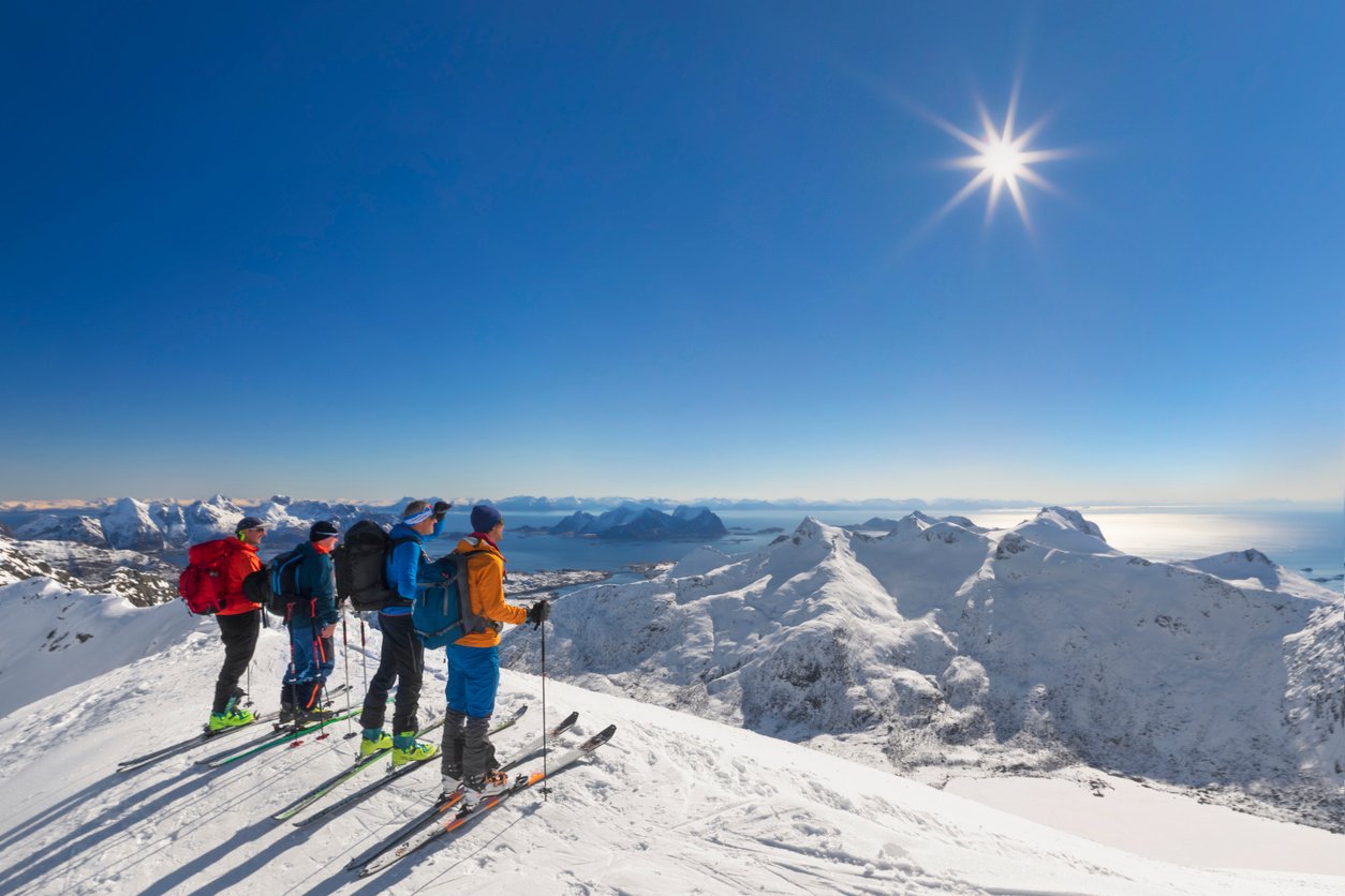Bluebird skies, Lofoten, and skiers
