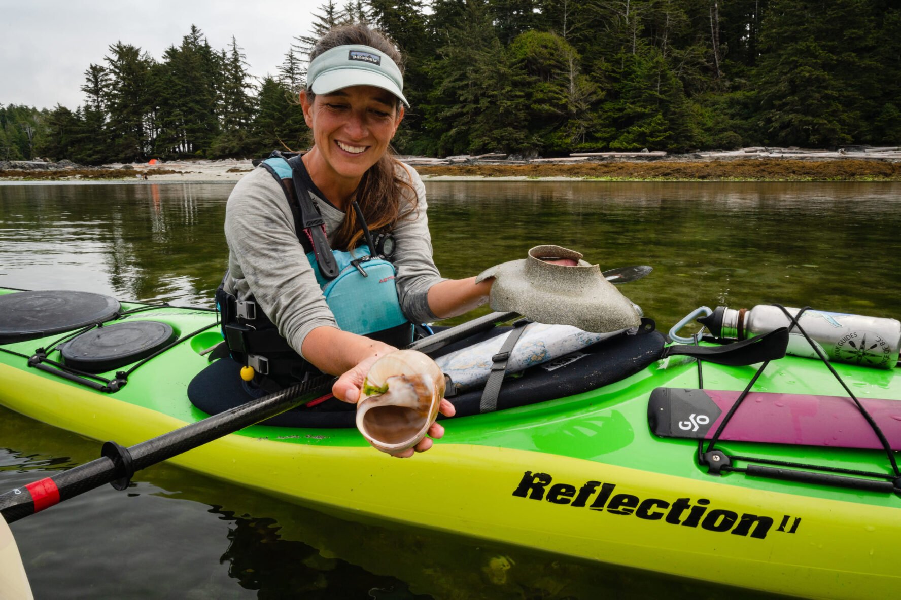 Kayaker with seashells