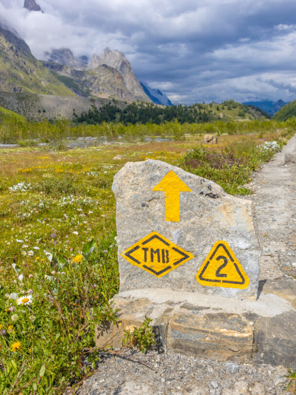 The TMB sign marking a trail in the Alps