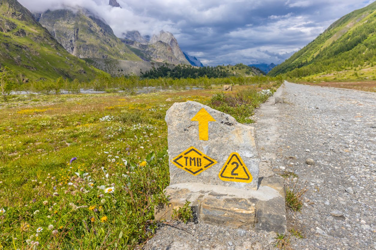 The TMB sign marking a trail in the Alps
