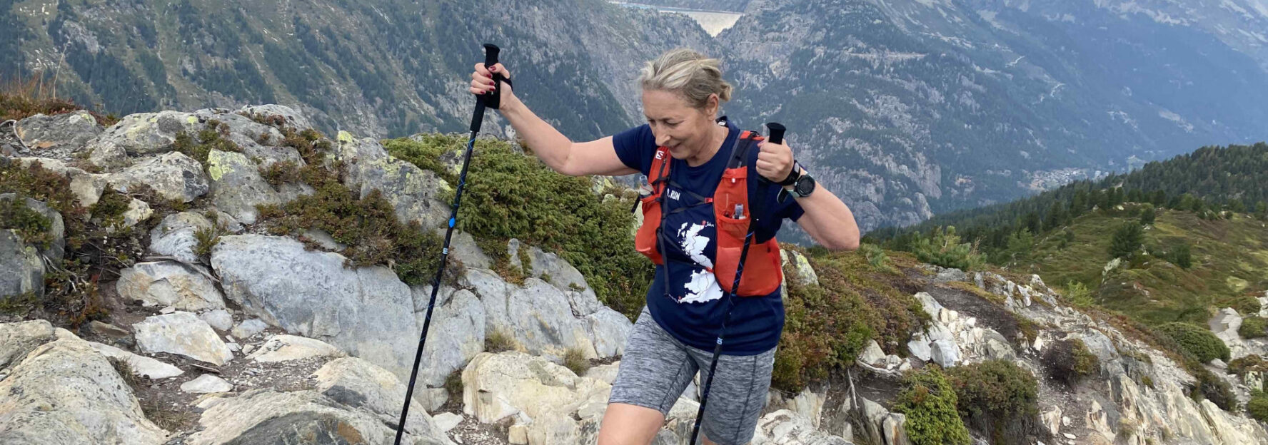Trail runner ascending a mountain path in the Chamonix area