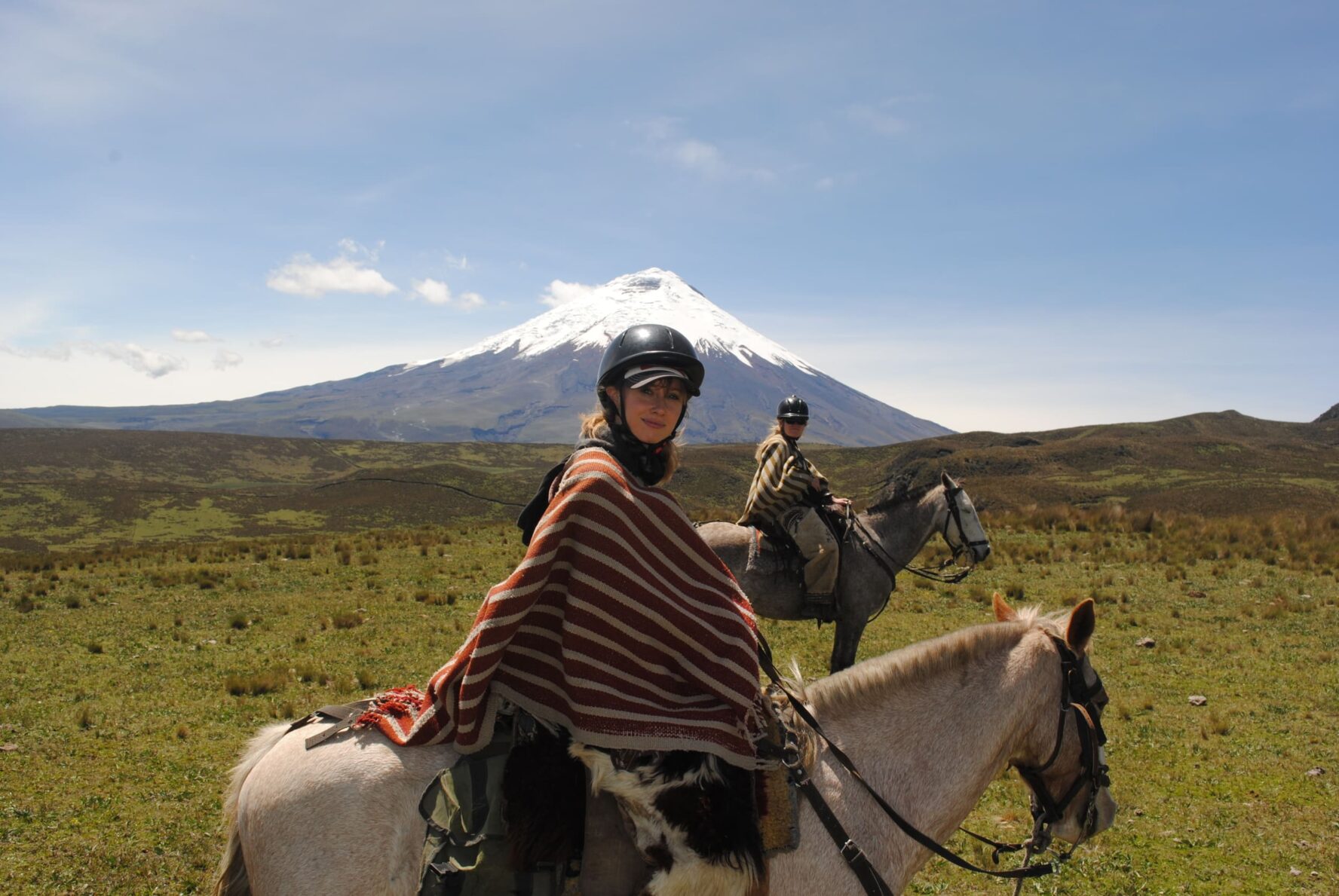 Cotopaxi couple riding