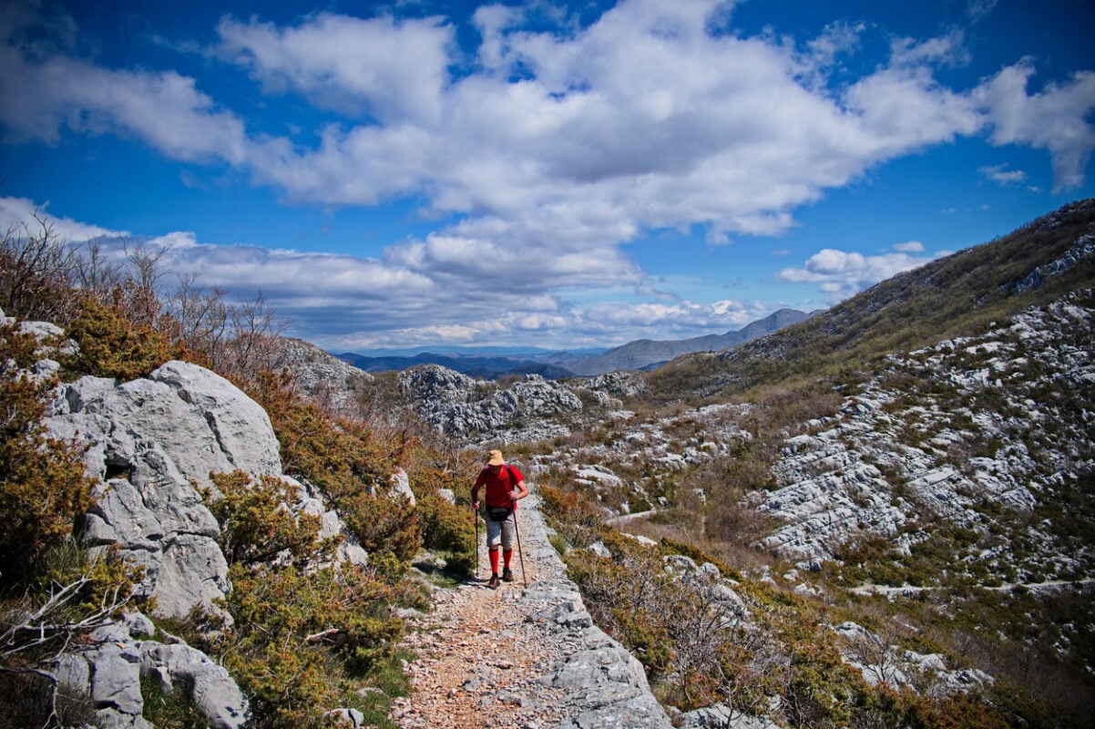 A senior man hiking in Croatia in March