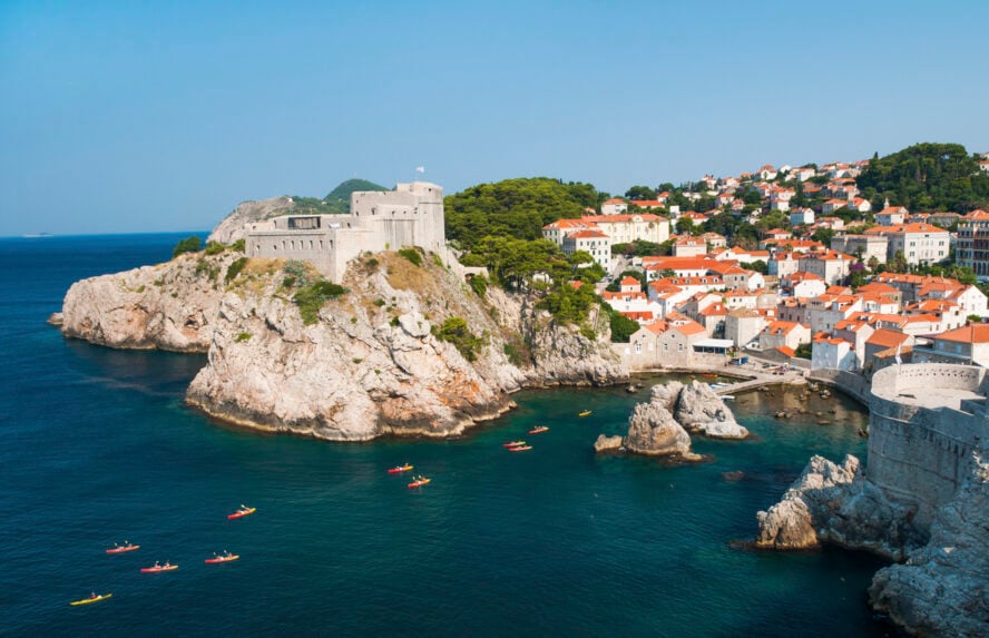 Kayakers near a rock in Dubrovnik, Croatia