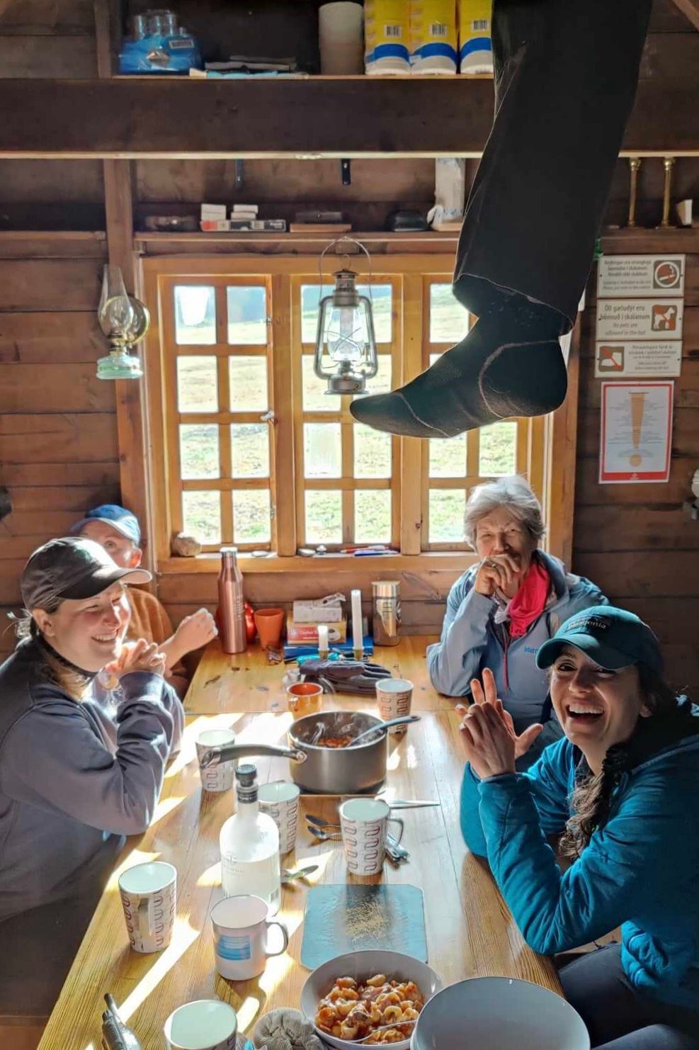 Hikers chilling in a hut in Iceland