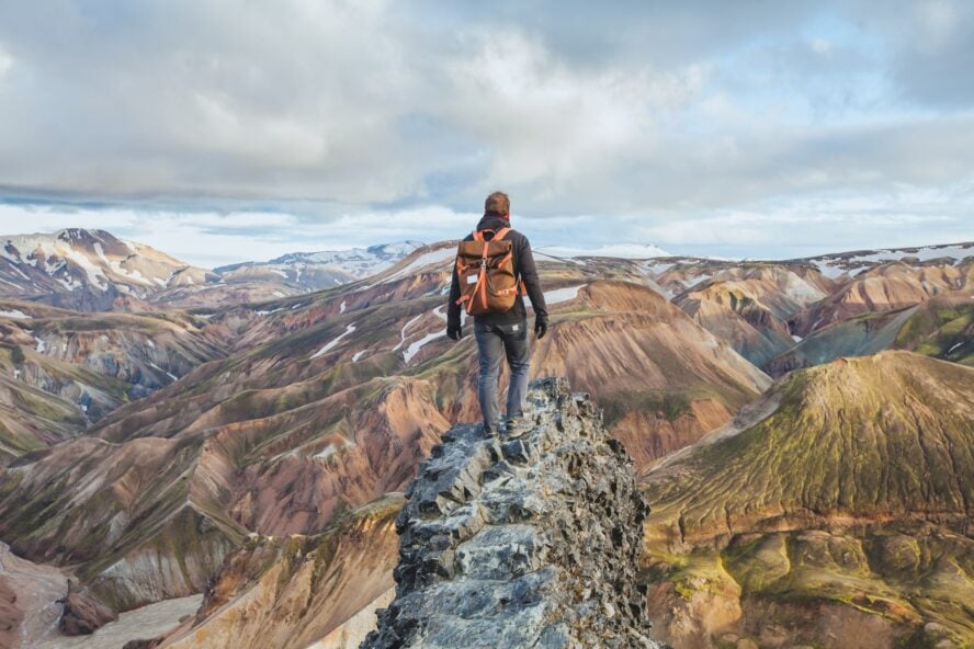 A hiker on Landmannalaugar looking at a vista