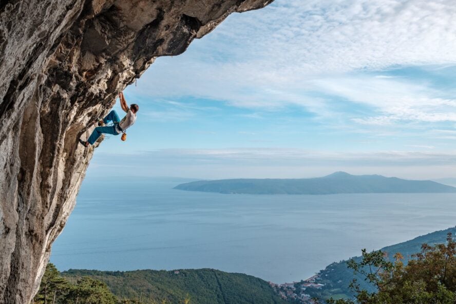 A climber in front of a beautiful vista in Moscenicka Draga, Croatia
