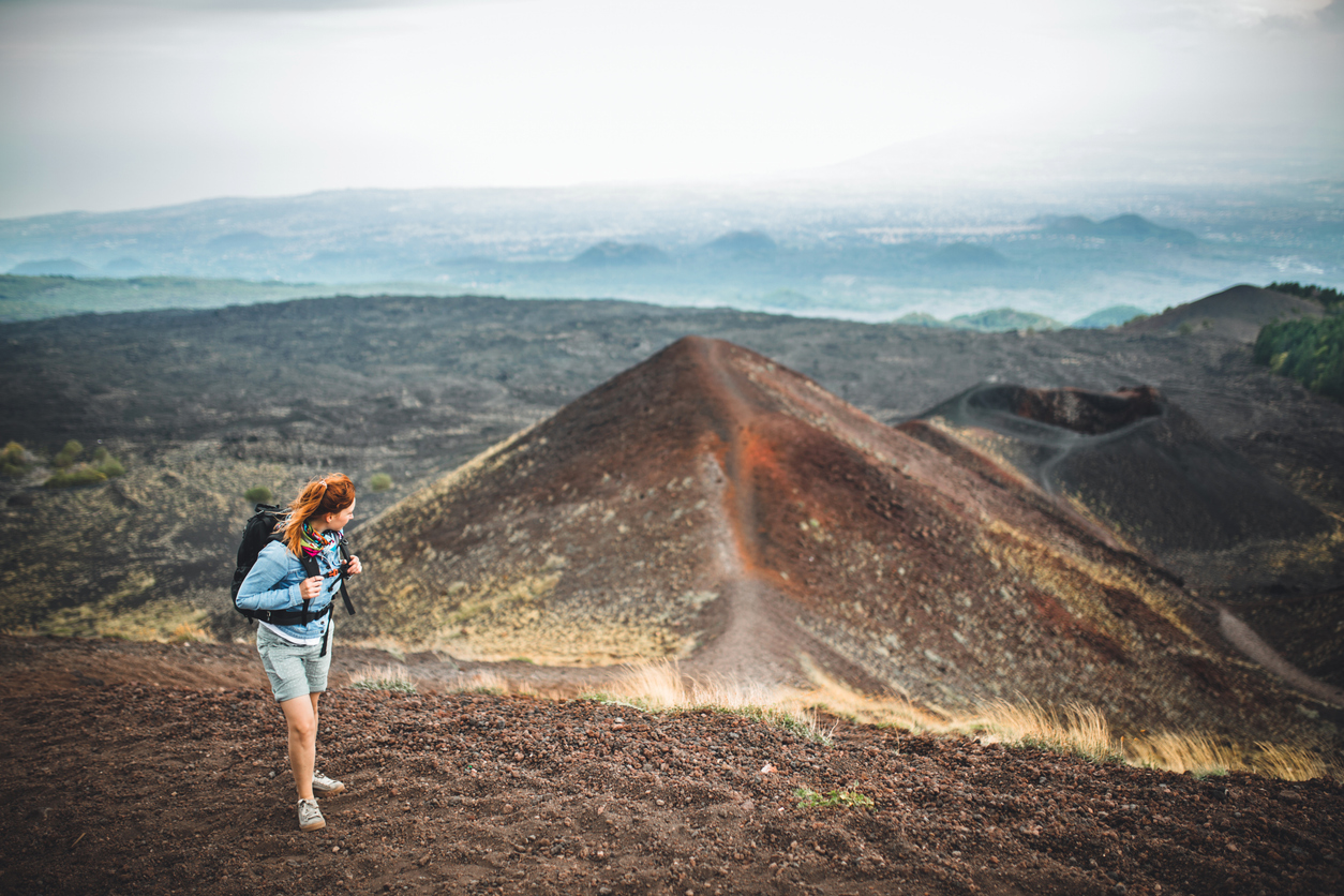Hiker climbing Etna Sicily Italy