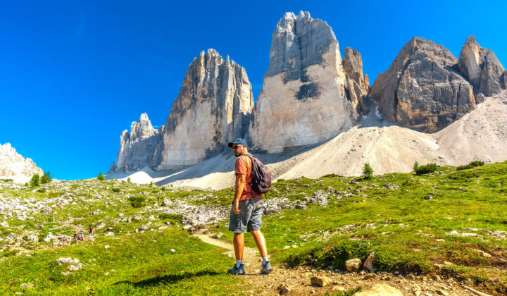 Tre Cime hiker sunny day