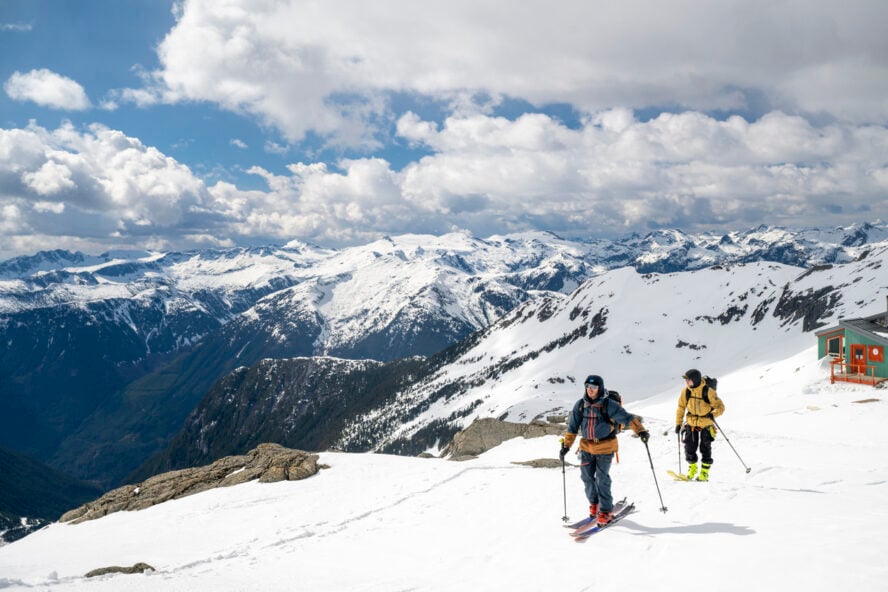 Backcountry skiers on a snow-capped mountain in Tantalus Range