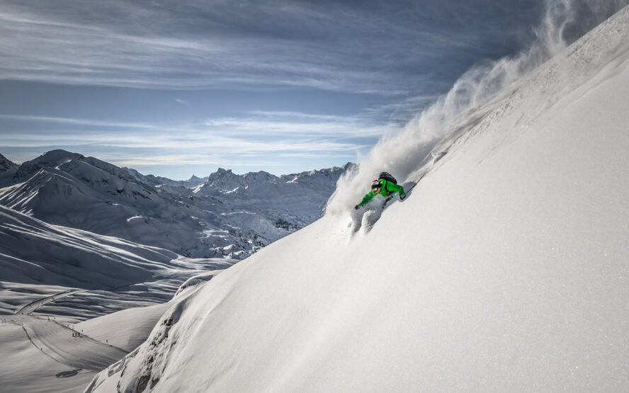 Backcountry skiing for beginners - man skiing on a mountain
