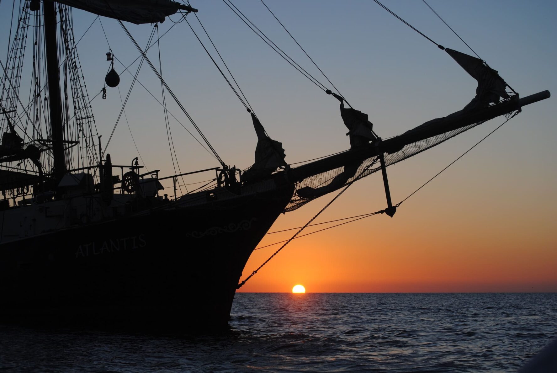 Sun setting Atlantis boat