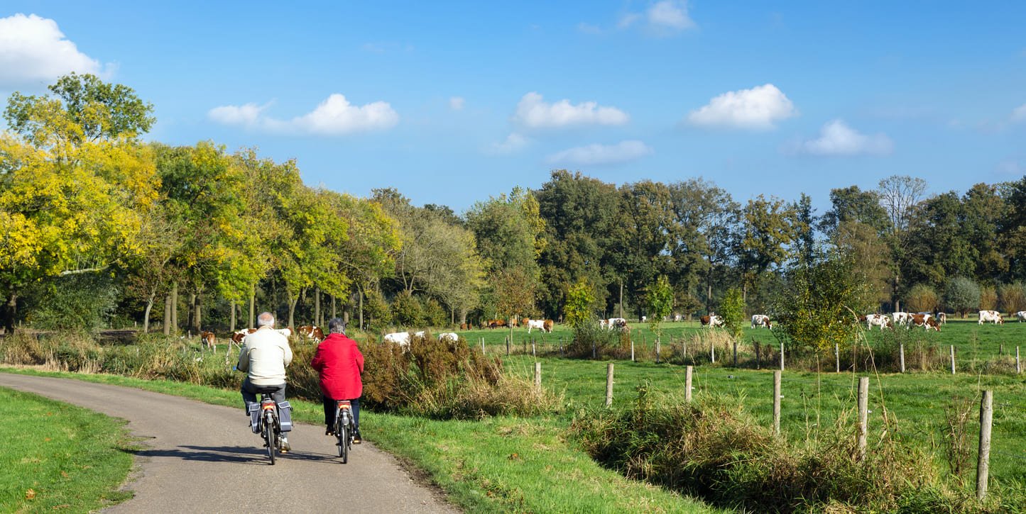 Two seniors cycling Netherlands