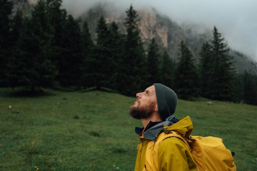 A hiker exploring the Alta Via 2 in the Italian Dolomites