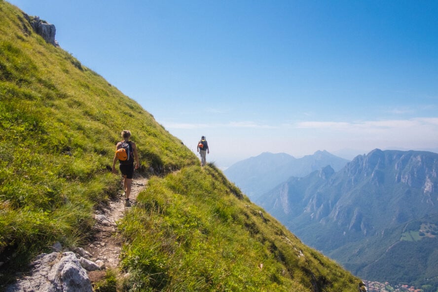 Hikers on a mountain path in the Swiss Alps
