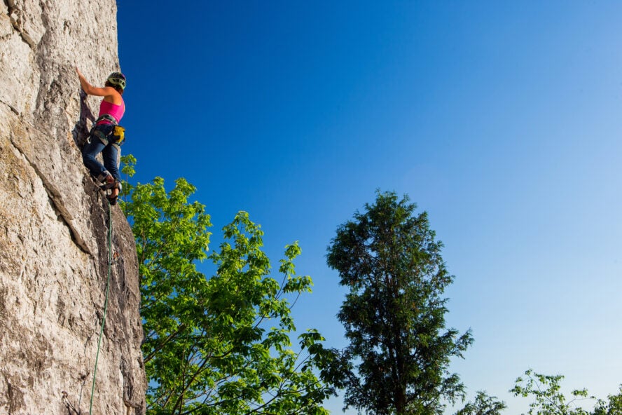 A rock climber in the Frankenjura area, Germany