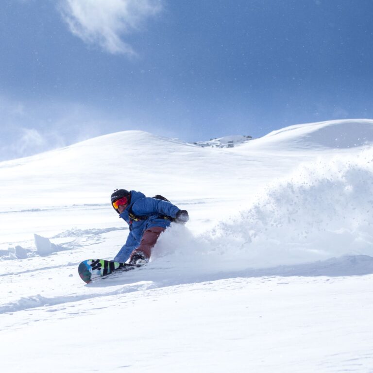 Fresh pow snowboarding