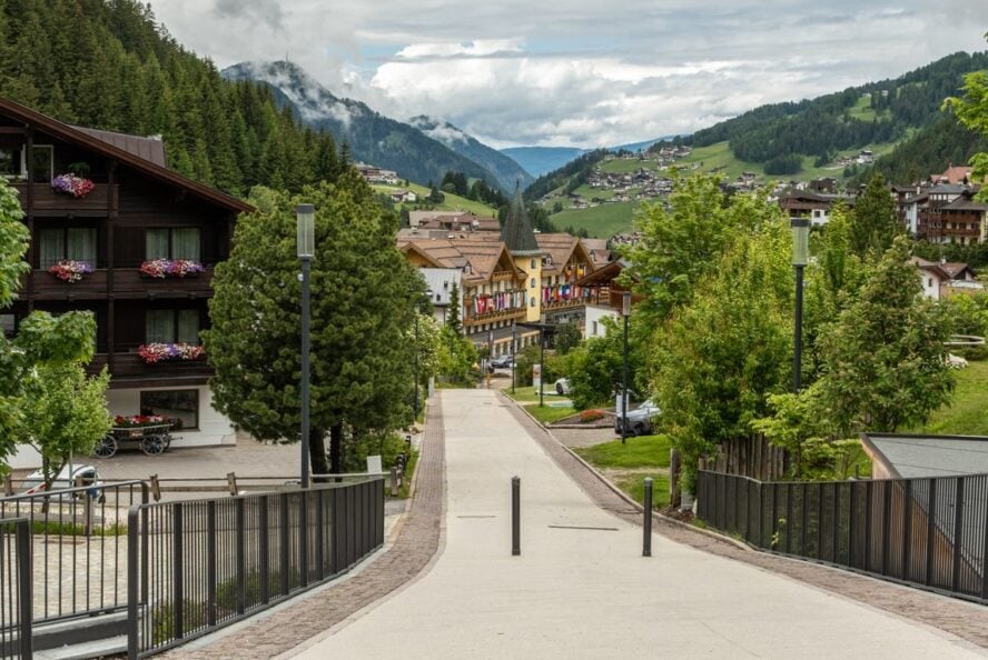 Pedestrian road and mountain alndscape in Val Gardena, Dolomites, Italy