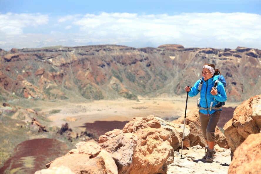Woman hiking on volcano Teide, Tenerife. Hiker near summit of Teide during hike on Tenerife, Canary Islands, Spain