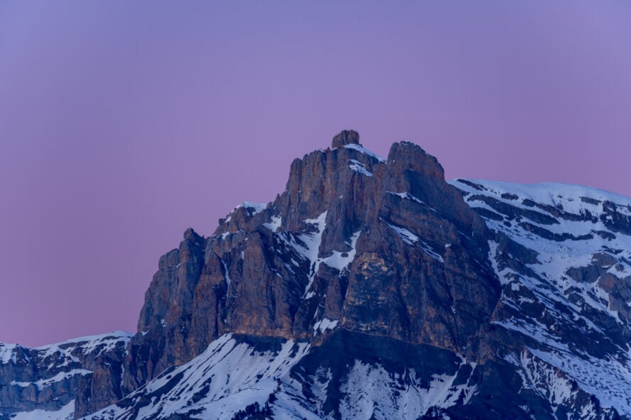 The rugged, snowy summit of Aiguille Rouge