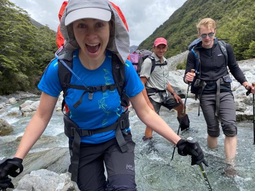 A group of hiking enthusiasts crossing Arthur's Pass in New Zealand