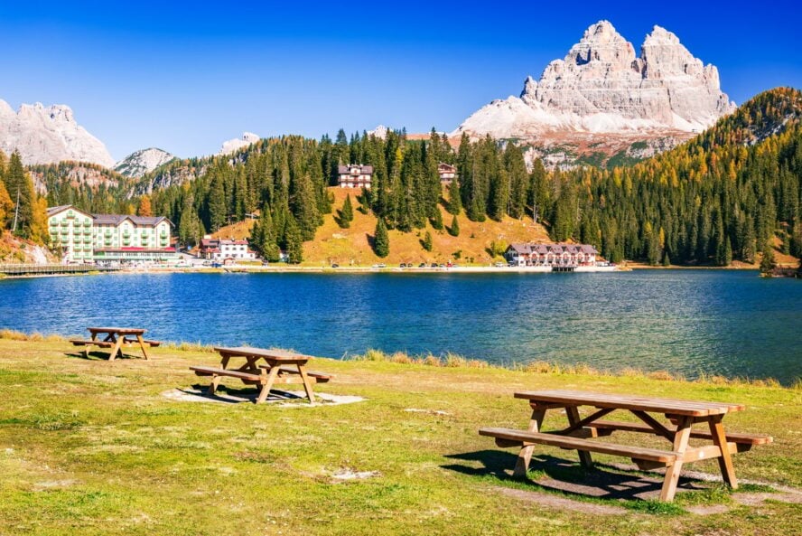 A bench on Misuruna Lake in the Dolomites, Italy