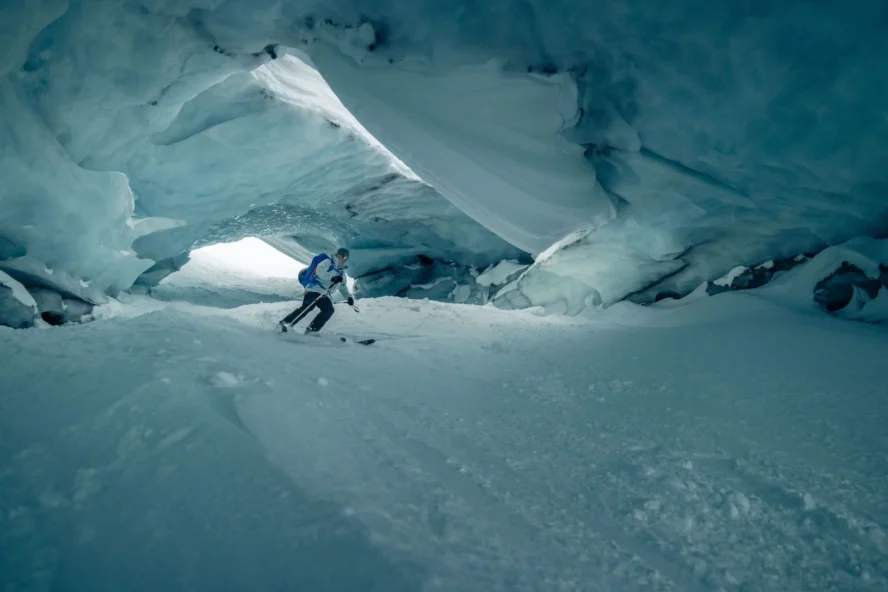 Skiing inside an ice cave in Svalbard, Norway