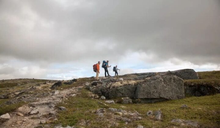 Alaska hikers on a cloudy day
