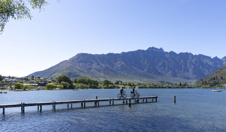 Bikers on a pier in New Zealand