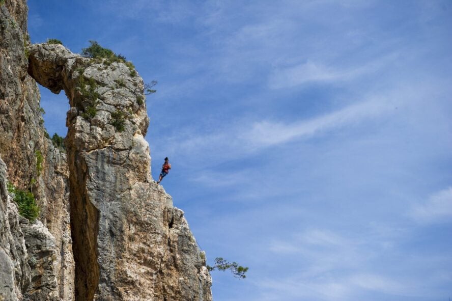 Climber on a rocky cliff