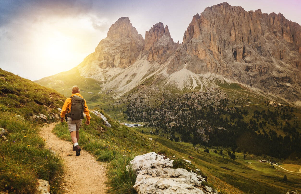 Hiker in the Dolomites' sun
