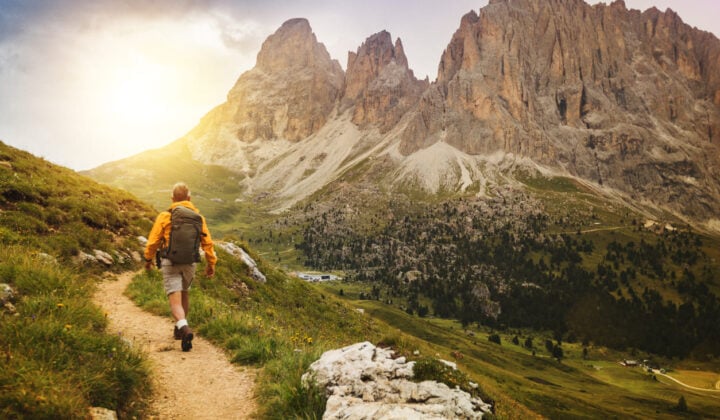 Hiker in the Dolomites' sun