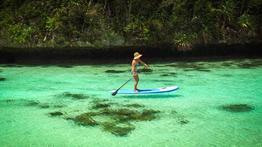 Paddleboarding woman