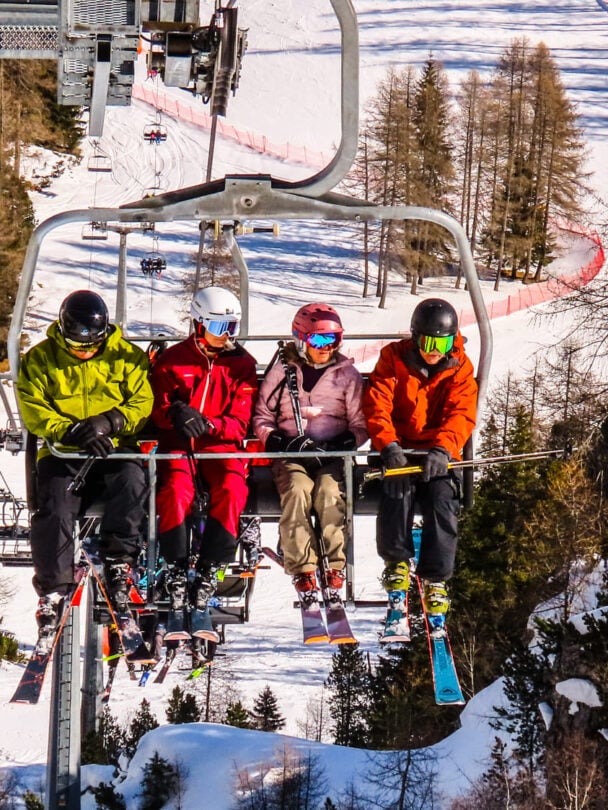 Skiers posing in the Dolomites