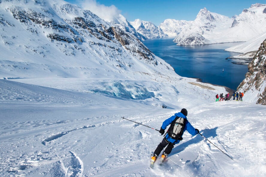 A skier skiing in West Greenland