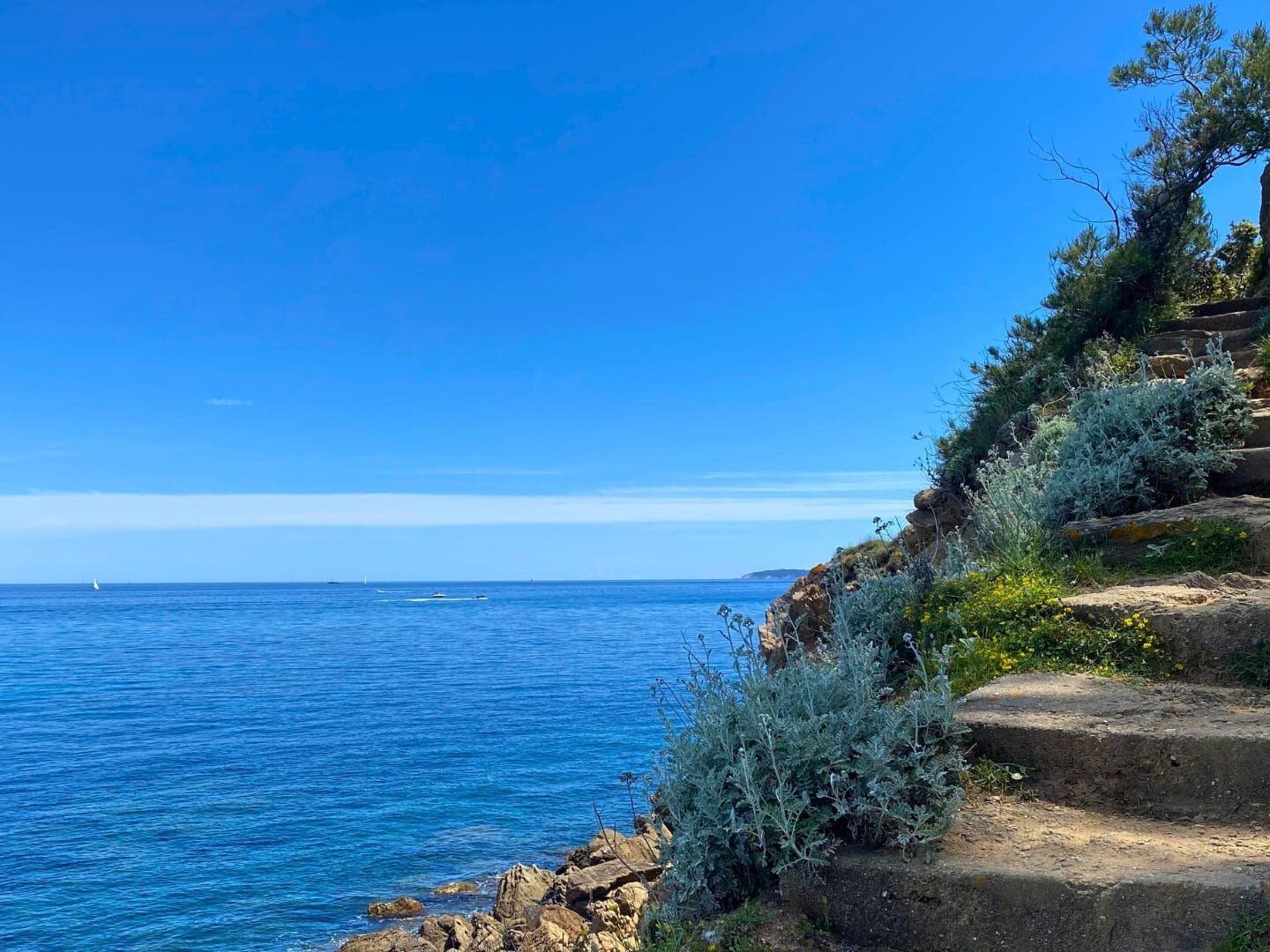 Stone path near sea on a sunny day