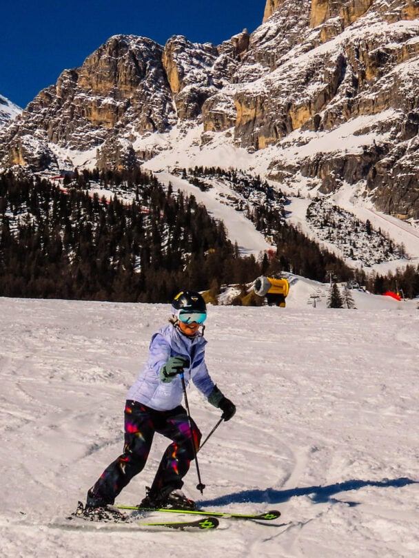 Skiers posing in the Dolomites