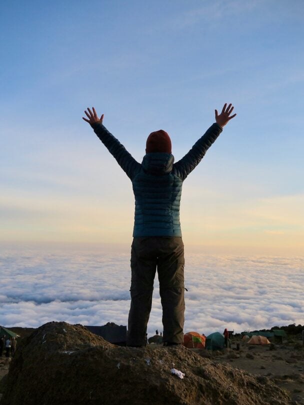 above clouds kilimanjaro trekker