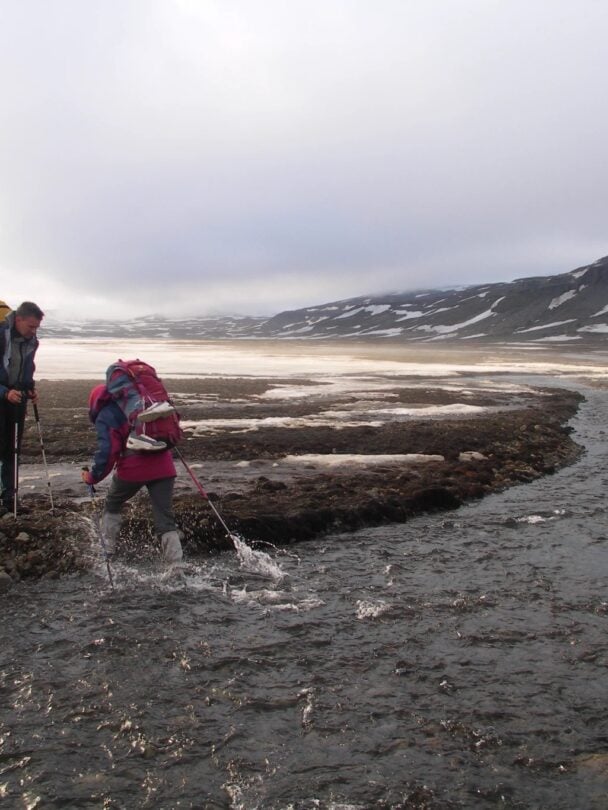 two hikers charcoal trail iceland